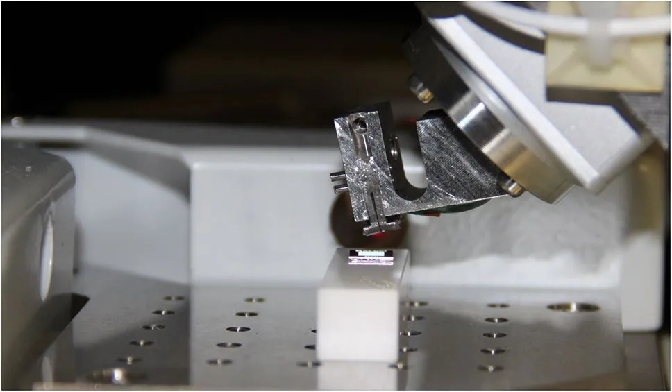 The AFM head with the self-sensing cantilever inside the nano measuring machine NMM-1 at FAU Erlangen-Nürnberg.